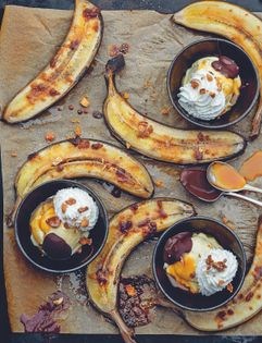 Grilled banana split with dark rum caramel sauce and chocolate fudge sauce