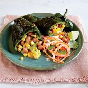 Grilled bean and cheese stuffed poblanos