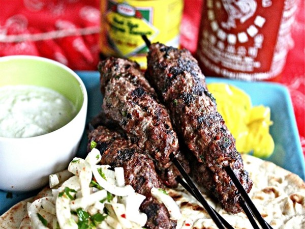 Grilled beef kebabs with yogurt-mint sauce and onion salad