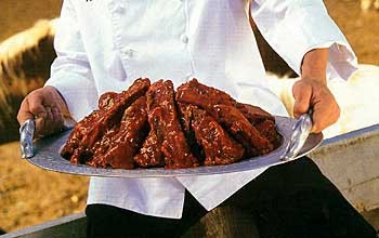 Grilled beef ribs with sweet-and-sticky barbecue sauce