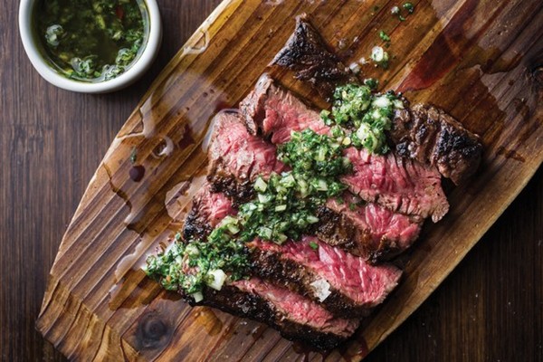 Grilled beef skirt steak with onion marinade