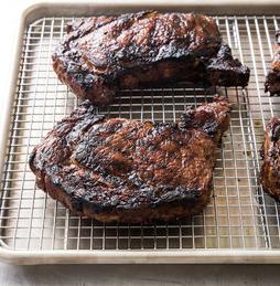Grilled bourbon steaks