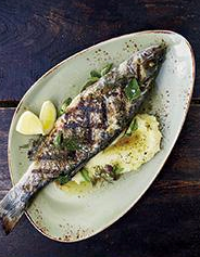 Grilled branzino with skordalia and ladolemono