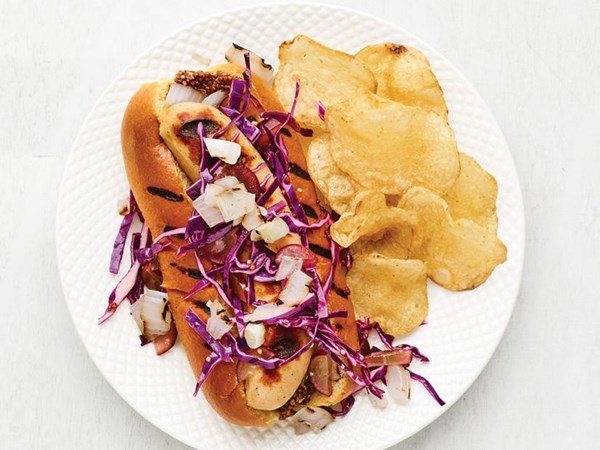 Grilled bratwurst with red cabbage-grape slaw