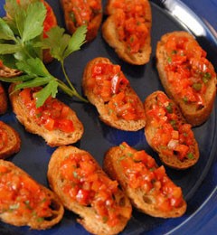 Grilled bread with ripe tomatoes and olive oil