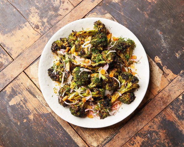 Grilled broccoli with harissa vinaigrette and pickled shallot