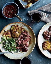 Grilled butterflied leg of lamb with ancho-huckleberry sauce