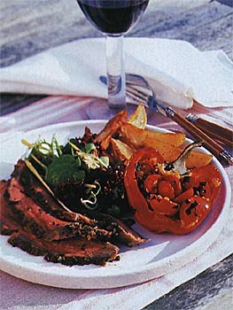 Grilled butterflied leg of lamb with lemon, herbs, and garlic