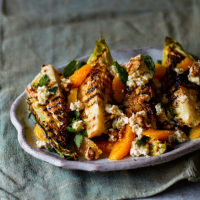 Grilled cabbage with goats' cheese, walnuts and orange