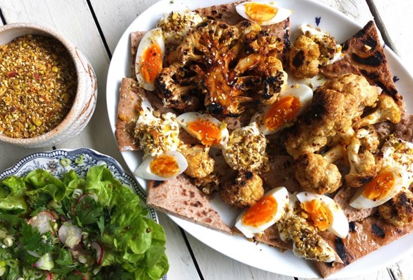Grilled cauliflower with labneh, dukkah and eggs