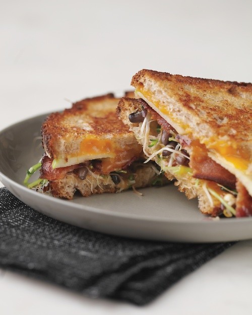 Grilled cheese with bacon, apple, and sprouts