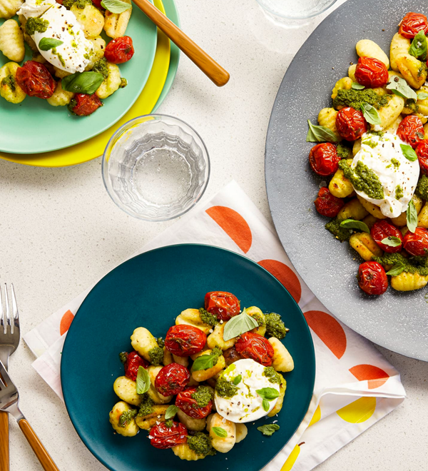 Grilled cherry tomatoes with gnocchi and burrata