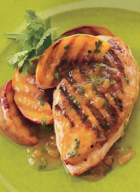 Grilled chicken and peaches with chipotle-peach dressing