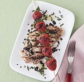 Grilled chicken and strawberries with balsamic syrup