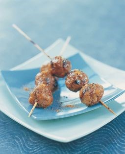 Grilled chicken balls cooked on bamboo skewers (Tsukune)