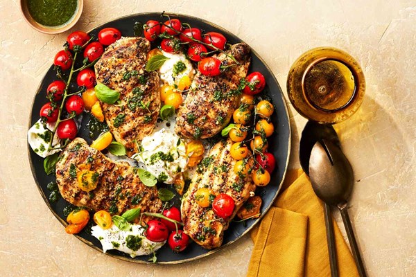 Grilled chicken Caprese with basil oil