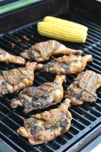 Grilled chicken legs with lemon and fresh herbs