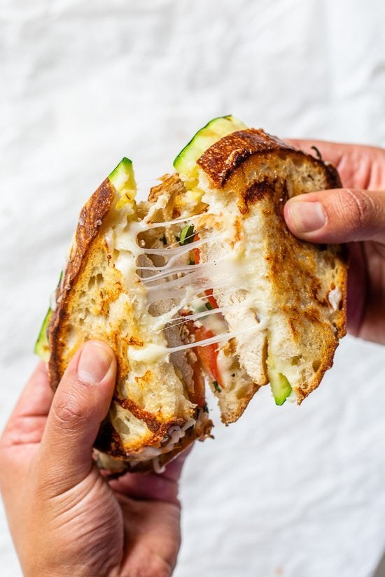 Grilled chicken panini with zucchini, tomato, and mozzarella