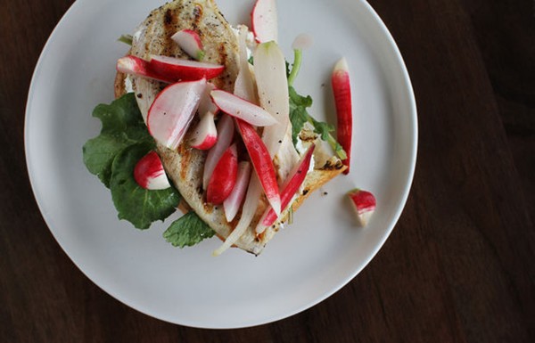 Grilled chicken sandwich with radish pickles & greens