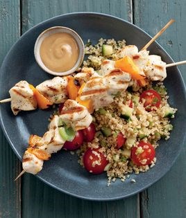 Grilled chicken skewers with spicy peanut sauce