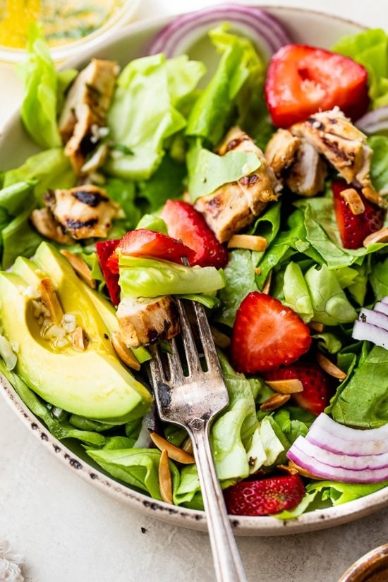 Grilled chicken, strawberry, avocado salad with citrus dressing