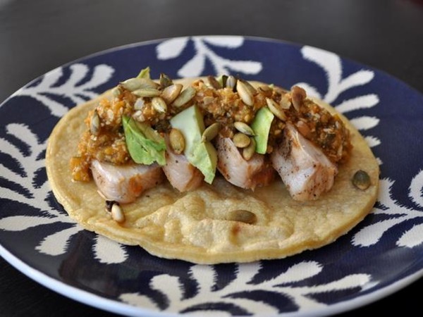 Grilled chicken tacos with pumpkin seed sauce