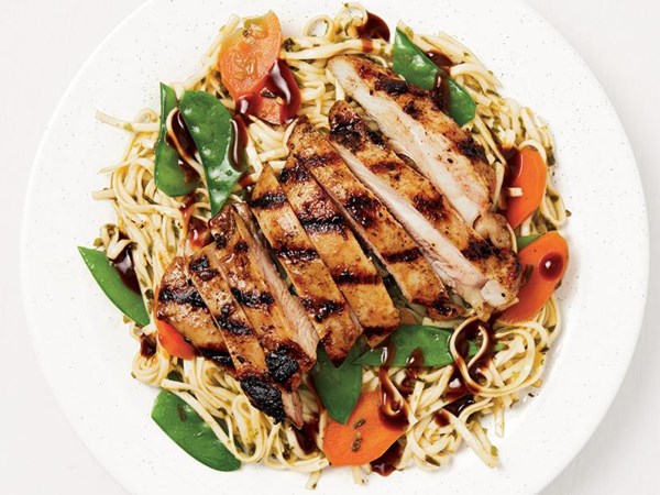 Grilled chicken thighs with ginger-scallion noodles 