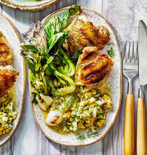Grilled chicken thighs with spring onions and baby bok choy
