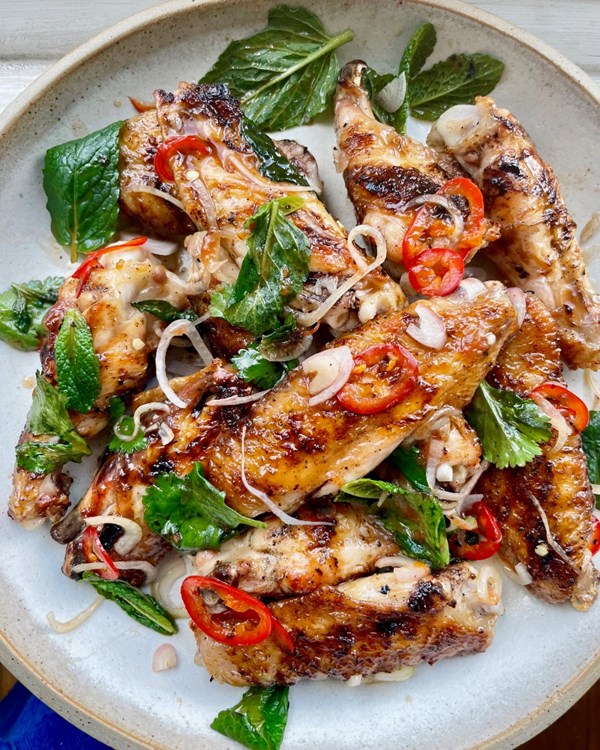 Grilled chicken wings with a grapefruit, tamarind and lime leaf dressing