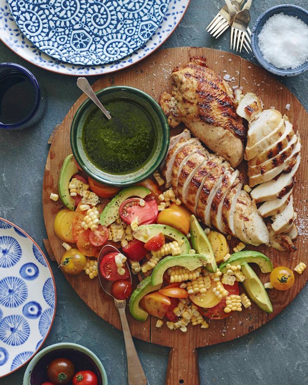 Grilled chicken with avocado tomato salad