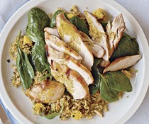 Grilled chicken with curried couscous, spinach, and mango
