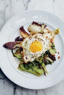Grilled chicories with crispy fried eggs & bacon vinaigrette