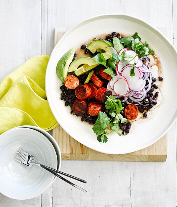 Grilled chorizo with black bean and avocado salad