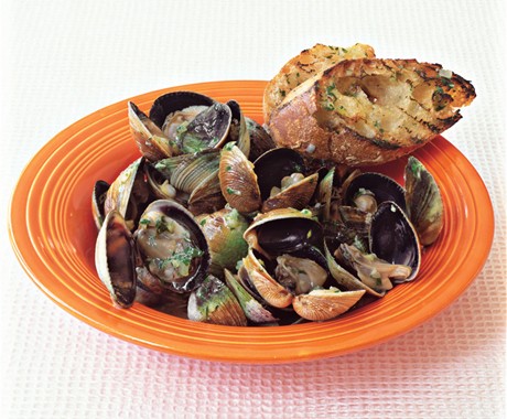 Grilled clams with lemon-ginger butter and grilled baguette