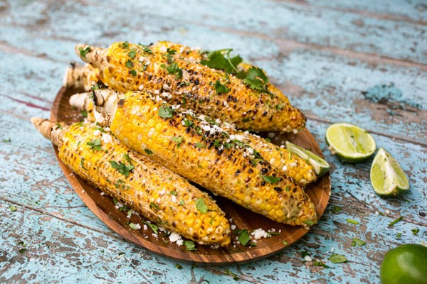 Grilled corn with cheese, lime and chile (Elotes)