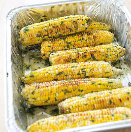 Grilled corn with flavored butter