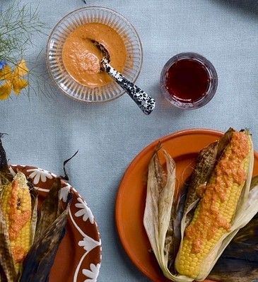 Grilled corn with red pepper sauce