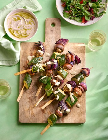 Grilled courgette, onion and mushroom skewers with pistachio pesto yogurt