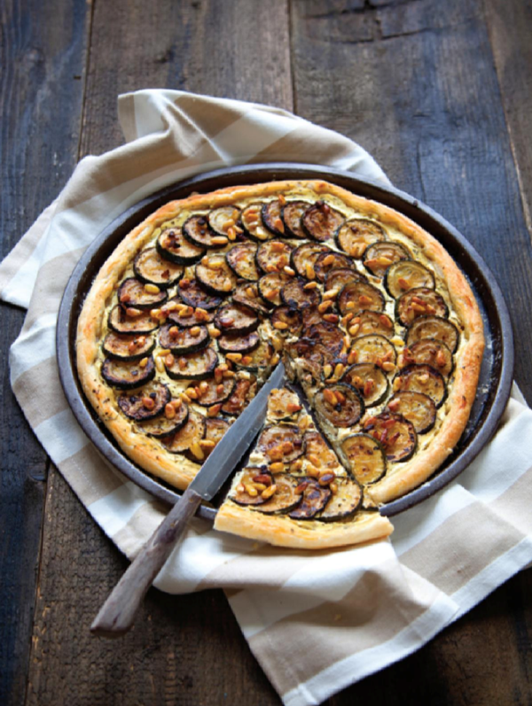 Grilled courgette, pine nut and herb tart