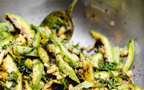 Grilled courgette salad, sumac and pine nuts