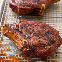 Grilled cowboy-cut rib-eyes