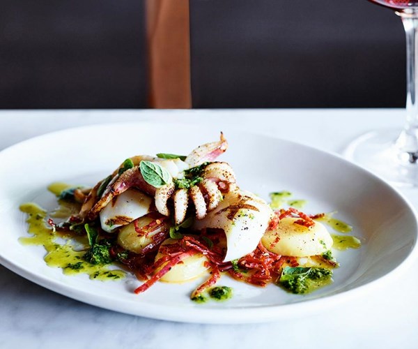 Grilled cuttlefish with new potatoes, sopressa piccante and green sauce