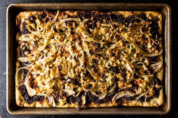 Grilled fennel flatbread with olives and sultanas