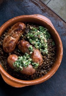 Grilled fennel sausages, lentils and green sauce