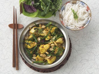 Grilled fish Hanoi-style with rice noodles and herbs (Cha ca Hanoi)