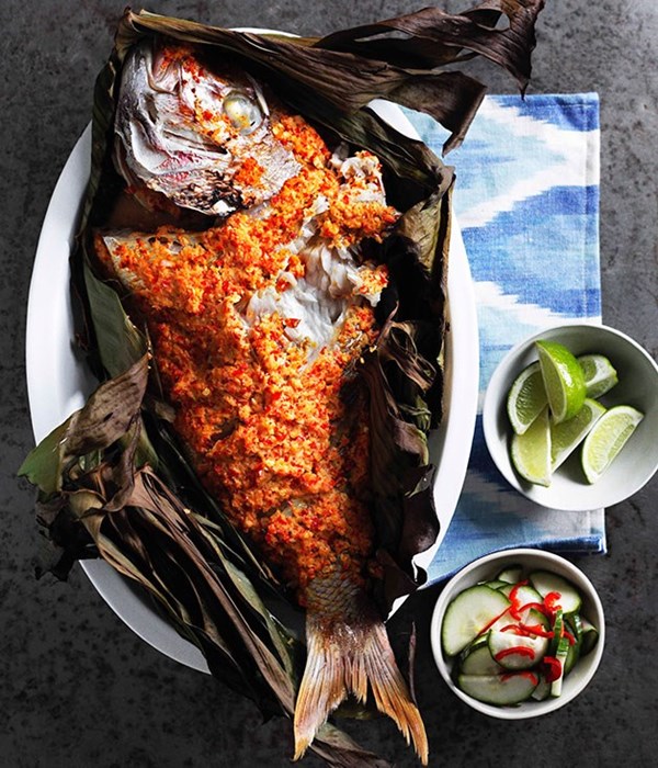 Grilled fish in banana leaves with cucumber pickle (Ikan panggang dengan acar ketimum)