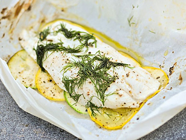 Grilled fish in parchment