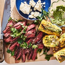Grilled flank steak and corn with garden herb butter