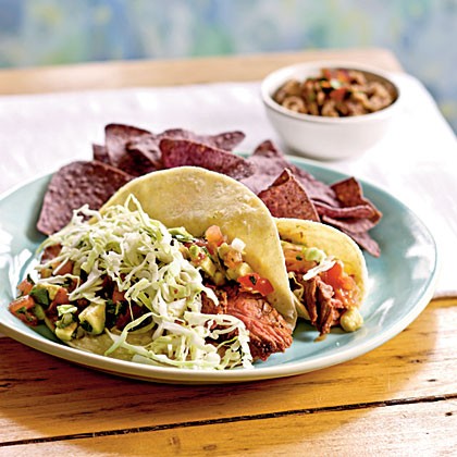 Grilled flank steak soft tacos with avocada-lime salsa