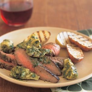 Grilled flank steak with baby artichokes and salsa verde